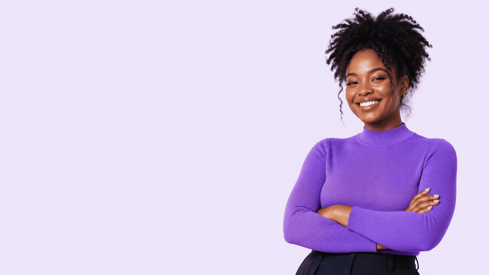 Creator smiling in a purple top